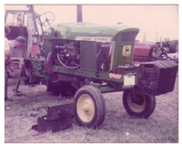 kenny smith,look close this has the ih head on the jd block,also axle housing broke at bg.jpg