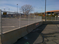 galvanized-chain-link-plated-to-jersey-barriers.jpg